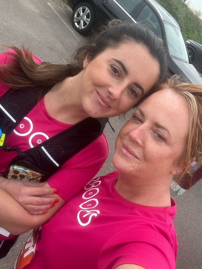 Two women getting ready for a marathon