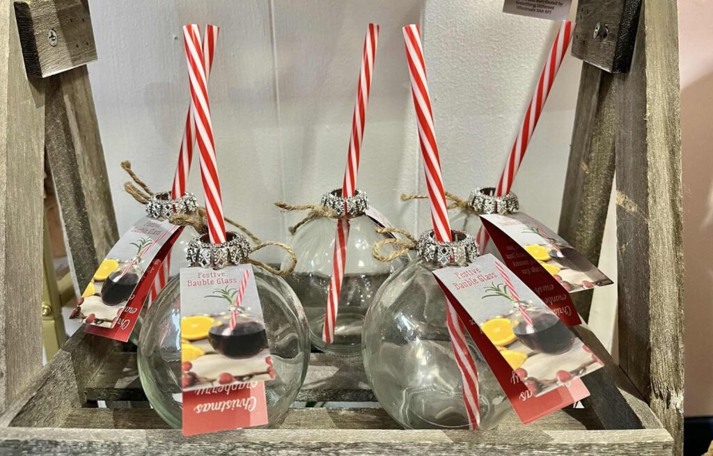 Glass spheres with red and white straws